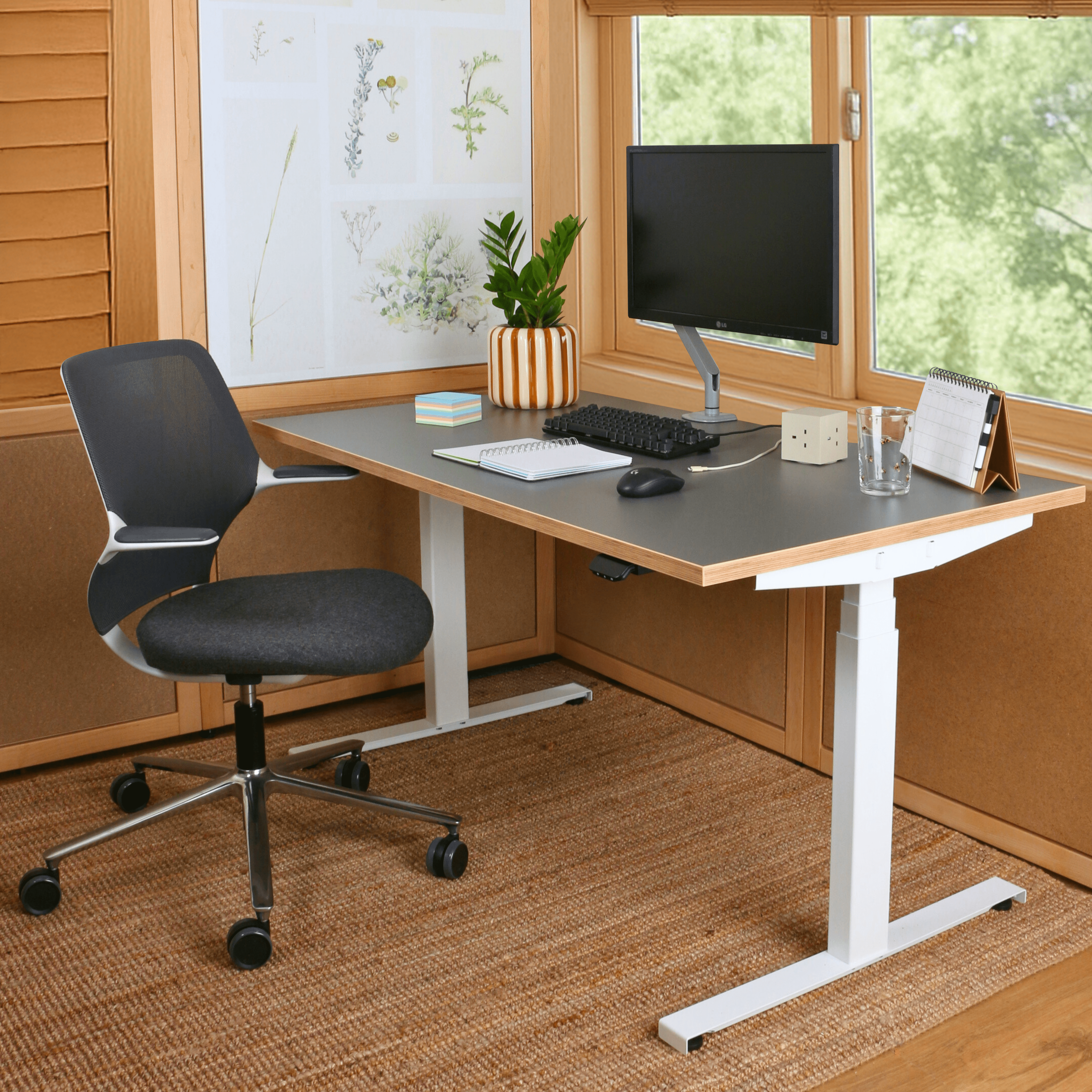 orange box office chair Work-from-home bundle with height-adjustable sit-stand desk and orange ergonomic office chair, ideal for home offices, remote workspaces, and flexible home setups. This home-compliant office furniture bundle combines modern design, comfort, and productivity. Available via purchase, subscription, or lease, supporting a circular economy and sustainable home office solutions. rent furniture