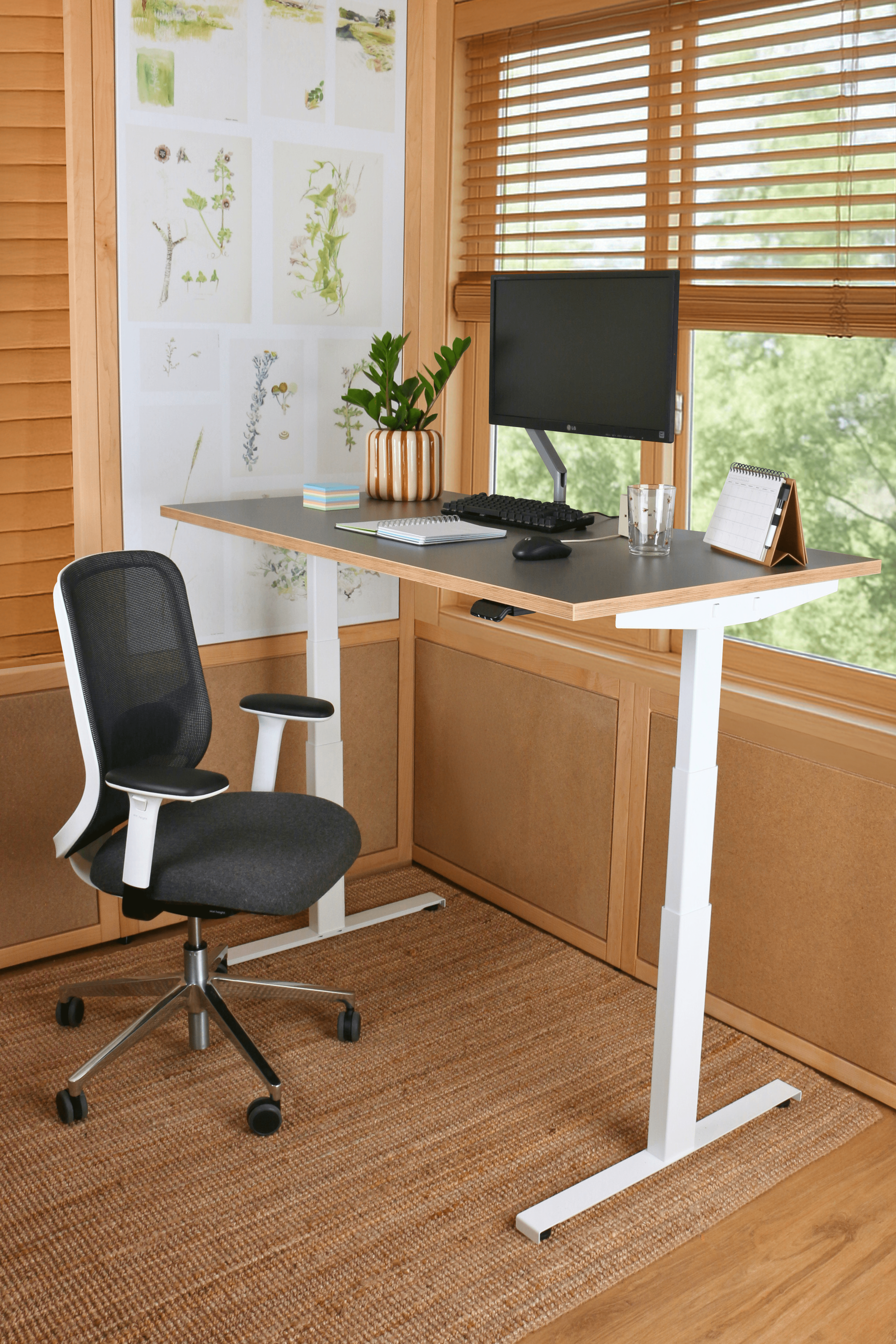 Work-from-home bundle with height-adjustable sit-stand desk and orange ergonomic office chair, ideal for home offices, remote workspaces, and flexible home setups. This home-compliant office furniture bundle combines modern design, comfort, and productivity. Available via purchase, subscription, or lease, supporting a circular economy and sustainable home office solutions. bluetooth