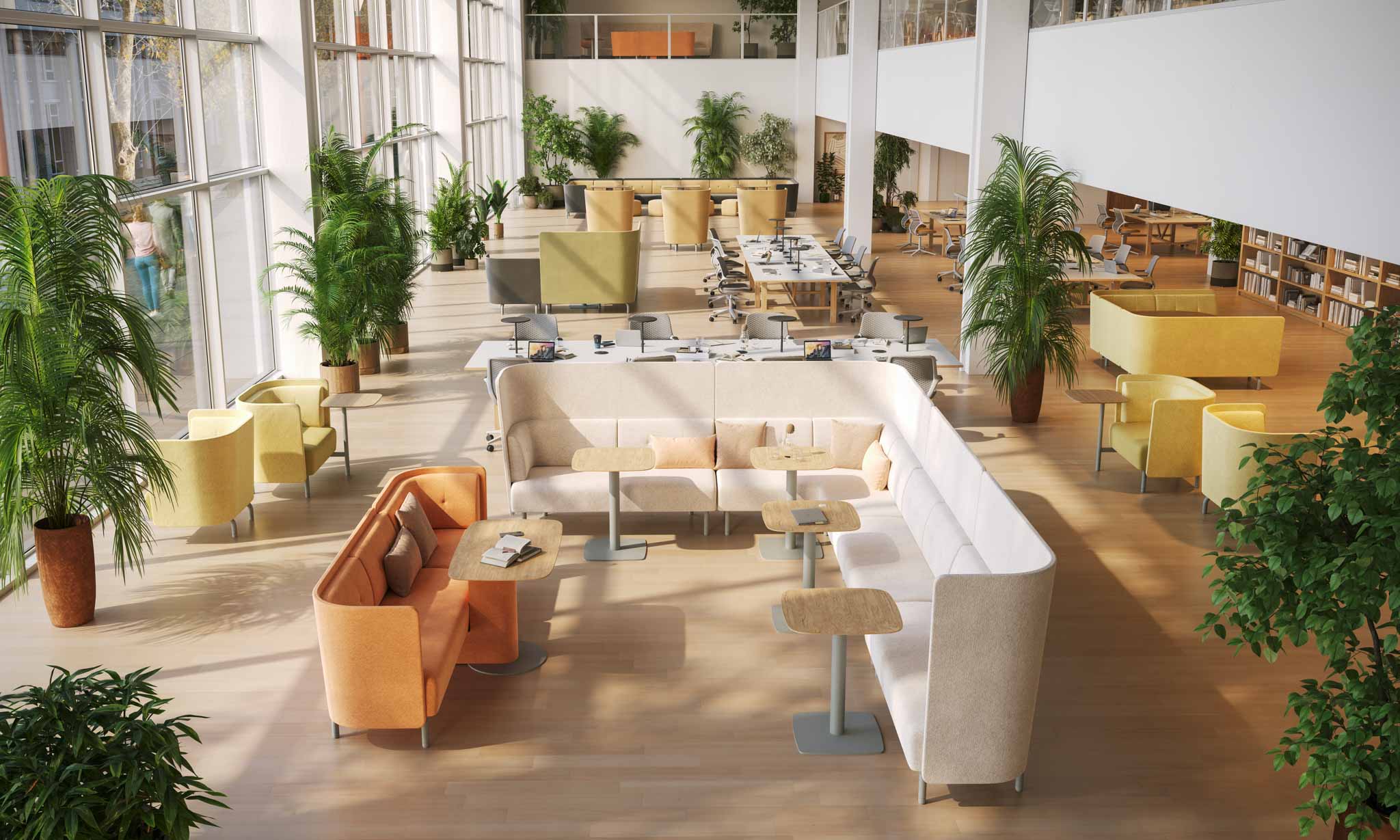 Modern office lobby with seating areas, tables, and plants. Orange Box Beyond Desk is a modern, height-adjustable sit-stand desk designed for home offices, commercial workspaces, coworking areas, and collaborative environments. Featuring ergonomic design, advanced cable management, and smart connectivity, it supports productivity, wellness, and flexible work setups. Available via purchase, subscription, or lease as part of a sustainable office furniture solution supporting a circular economy.